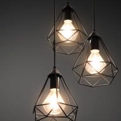 Decorative ceiling lights / hanging lights on dark background with copy space